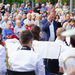 Blick über das Orchester und den Dirigenten auf die Zuschauer