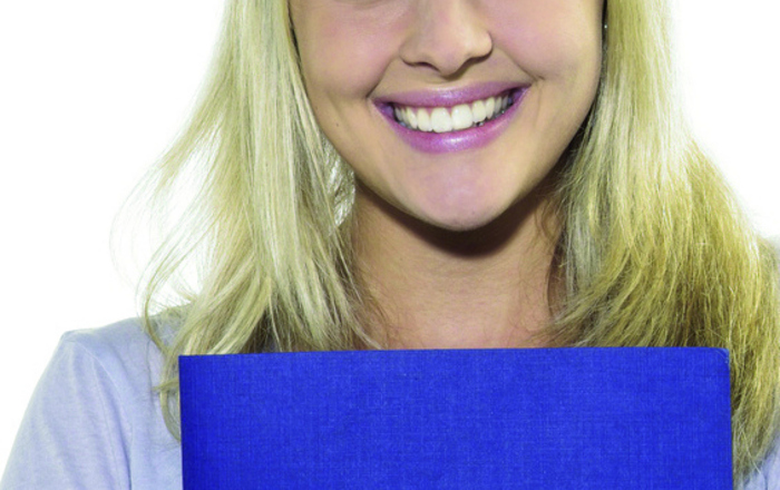 woman with an application portfolio in her hand
